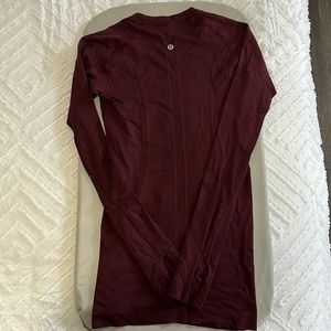 Maroon long-sleeve Lululemon shirt
